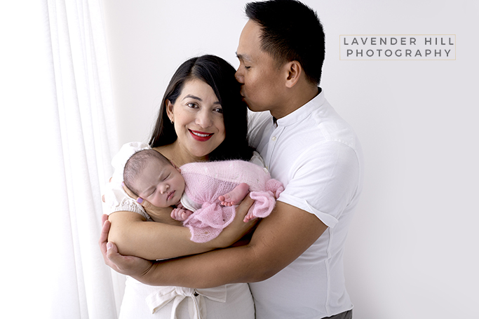 newborn photography london, timeless and simply beautiful photograph of a family with a baby girl